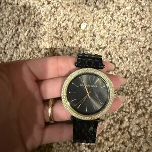 Michael Kors Black and Gold Timepiece